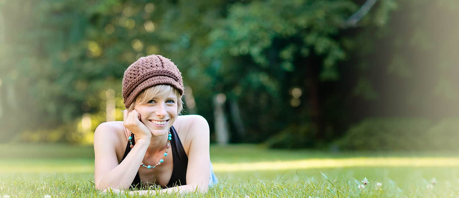 Tracy Raft lying down on grass